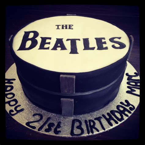 A Birthday Cake With The Beatles On It
