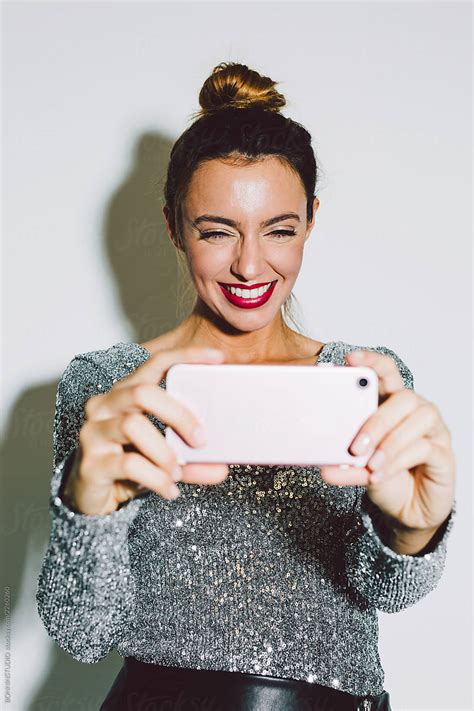 Beautiful Glamorous Woman Taking A Selfie In A New Year Party Celebration By Stocksy