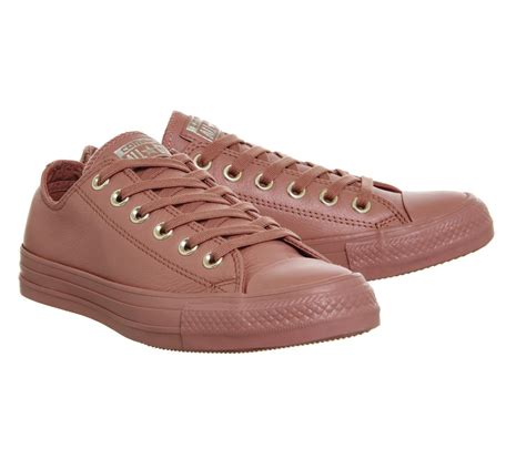 Converse /ˈkɒnvərs/ is an american shoe company that designs, distributes, and licenses sneakers, skating shoes, lifestyle brand footwear, apparel, and accessories. Converse All Star Leather Low-Top Sneakers in Desert (Pink ...
