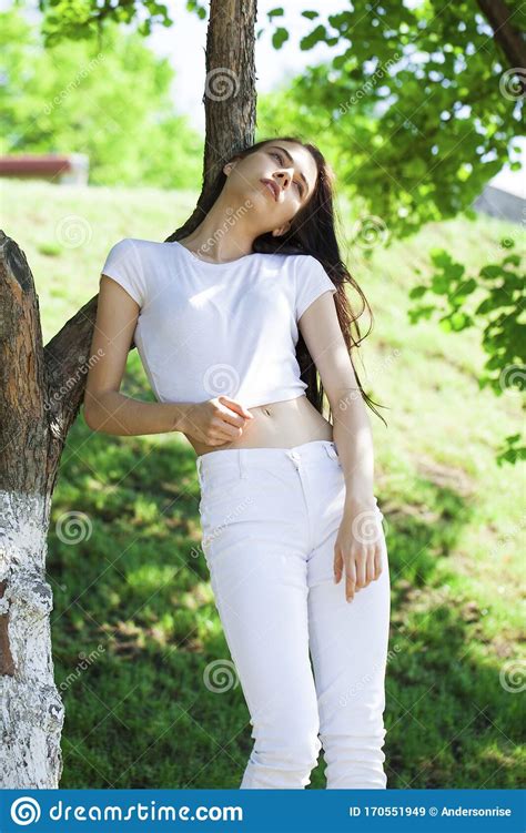 Beautiful Brunette Woman Posing Against Summer Park Bright Sunny Weather Stock Image Image Of