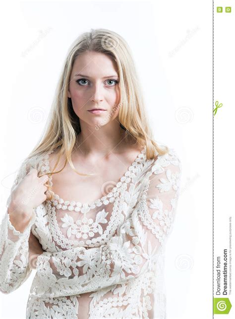 Beautiful Russian Blonde Girl On A White Background In A White