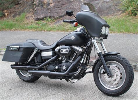 Inner fairing is black textured abs and outer shell is opaque black lucite with a class a finish that looks great as is or can be painted easily (see file below for memphis shades paint. Tsukayu Fairing, Hard Saddlebags and Touring Trunk