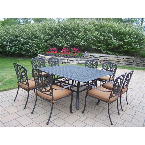Black enamel finish prevents rust buildup. Oakland Living Cast Aluminum 9-Piece Square Patio Dining ...