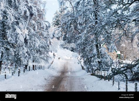 Snow Covered Road In The Scottish Highlands Stock Photo Alamy