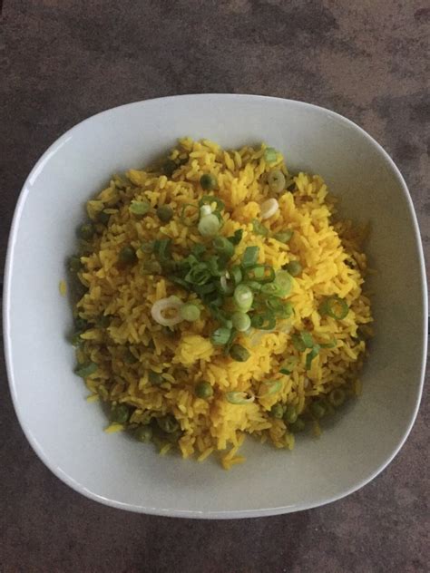 Cover the rice, lower the heat to a simmer, cook for 20 minutes. Yellow Rice with Peas - Cook For Your Life