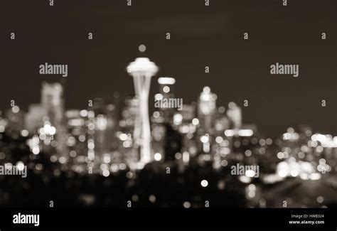 Seattle City Skyline At Night With Urban Office Buildings Viewed From