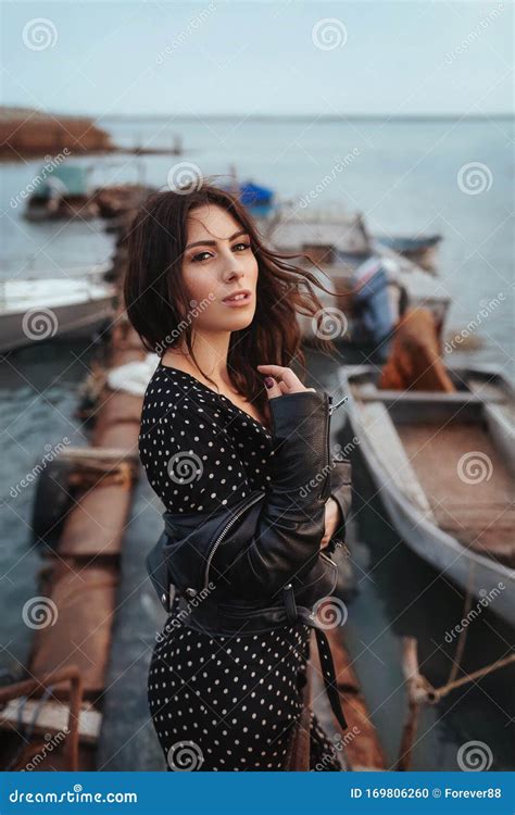 Portrait Of Beautiful Sexual Woman With Makeup In Fashion Clothes Stock