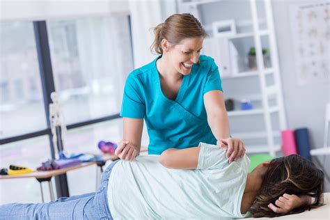 Tennessee Chiropractic Association Chiropractor Adjusts Female Patient