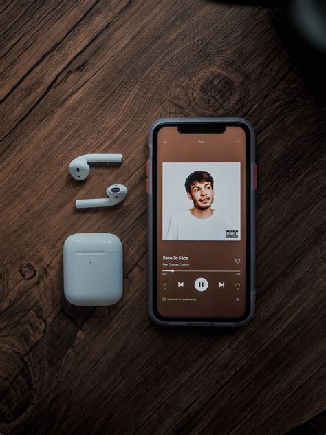 iphone mockup  airpods   wooden table  mockup