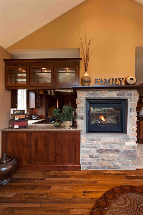 White country squire stone veneer is the featured wall stone in a mortared stone veneer masonry application for the fireplace stone, with a cozy seating area and floating wood shelves for the perfect home decor. Pin by Quality Stone Veneer on 101 Creative Fireplace Ideas | Fireplace, Stone veneer, Home decor