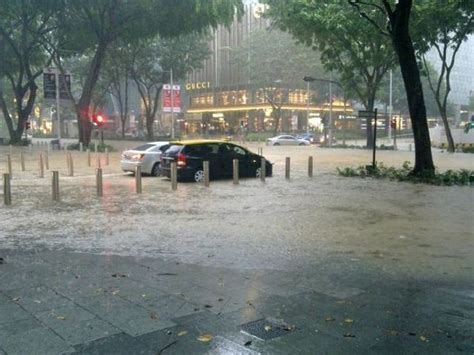 Flash floods caused by heavy downpour on wednesday morning wreaked havoc on many parts of central singapore, flooding basement carparks and shops, and making roads impassable to cars. mrbrown.com: Someone call the Minister of Freak Incidents ...