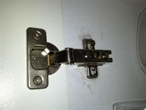 One inescapable feature of kitchen wall cabinets: Fix kitchen cupboard hinges - Restoration & Refurbishment ...