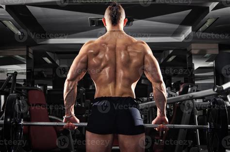 Muscular Man Lifting Some Heavy Barbells 783167 Stock Photo At Vecteezy