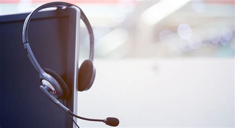 After you have hung up, or after the call has stopped ringing, pick up the phone again and listen for a dial tone. Close Up Focus On Call Center Headset Device At Voip ...