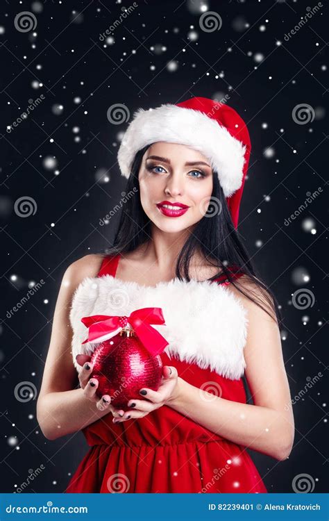 Smiling Girl Holding A Red Christmas Tree Balls Women On Dress And