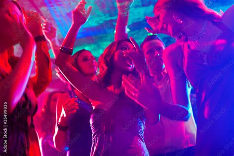Party People Dancing In Disco Or Club Stock Photo Adobe Stock