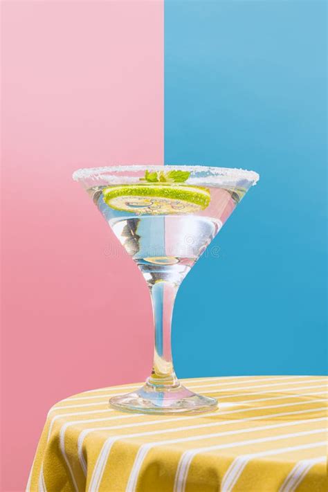 Glass Of Delicious Martini Cocktail Isolated Over Pink Blue Background Party Degustation Stock