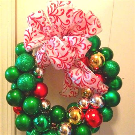 Christmas Wreath Made With Ornaments A Wire Clothes Hanger And Ribbon