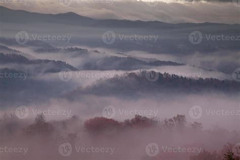 Red Hued Morning Fog Over Smoky Mountains 1325351 Stock Photo At Vecteezy