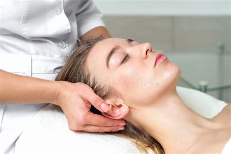 Young Woman Receiving A Head Massage By Female Beautician Stock Image Image Of Care Massaging