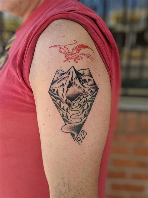 You should get this design and place it on your shoulder if you prefer bigger & bolder tattoos. Lord Of The Rings Tattoo Cast Members