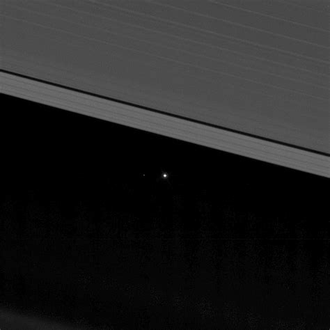 Earth Beams From Between Saturns Rings In New Cassini
