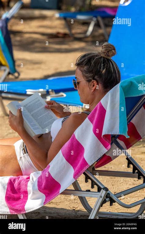 Woman Sunbed Bikini High Resolution Stock Photography And Images Alamy