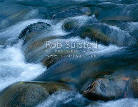 Water Cascading Over Stones Or Rocks On The Tongariro River Riffle Or