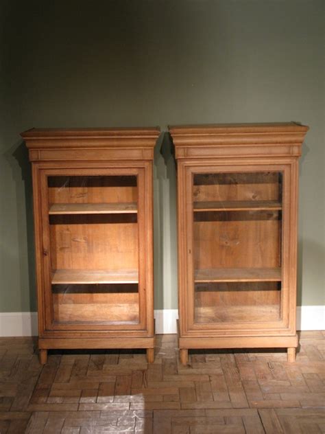 The clear lacquer finish beautifully highlights the prominent oak grain. Pair of Antique late C19th French Bleached Oak Display ...