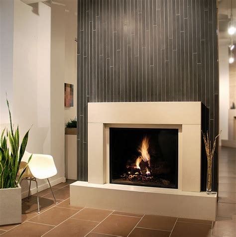 Fireplace Featuring A Wall Of Beautiful Tiles Contemporary Fireplace