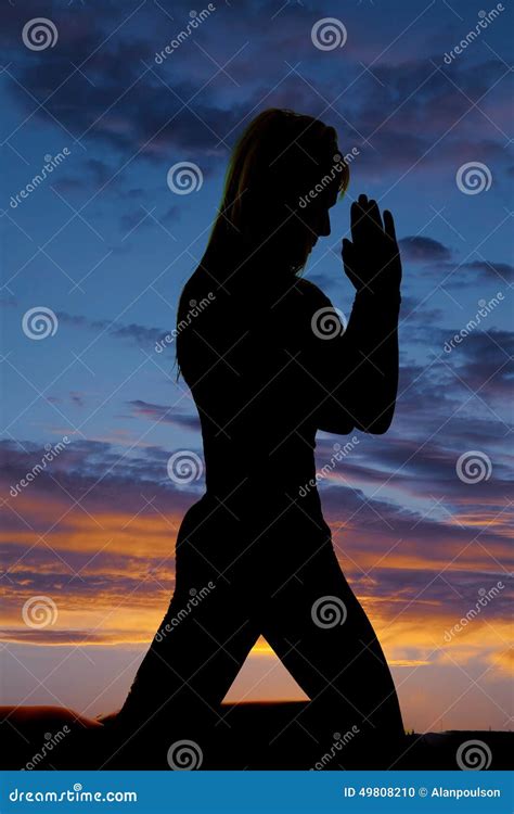Silhouette Of Woman Kneel And Pray Stock Photo Image 49808210