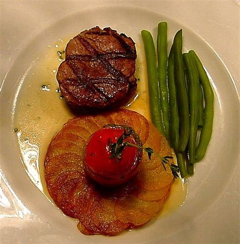 Peaches are grilled with a balsamic glaze, then served up with crumbled blue cheese. Food Plating Idea. Beef Tenderloin, Pomme Anna, French ...