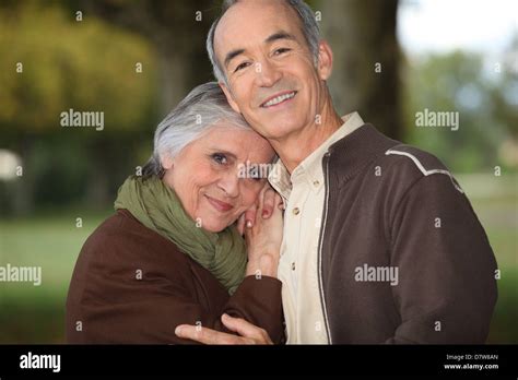 Mature Couple Embracing Stock Photo Alamy