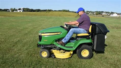 John Deere X300 Riding Lawn Mower With 2 Bag Bagger Youtube