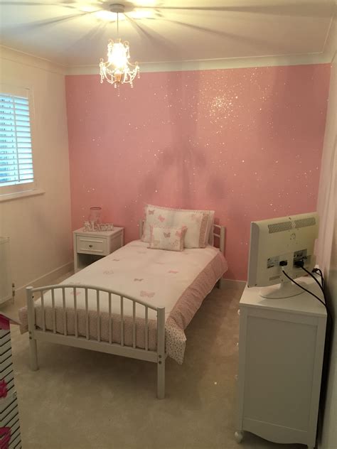 Pink bedrooms featuring blush bedroom accessories, pink accent walls, pink headboard walls, pink bed bases, pink bedroom chairs, b. Baby Pink #Glitterwallpaper used here in a girls' bedroom ...