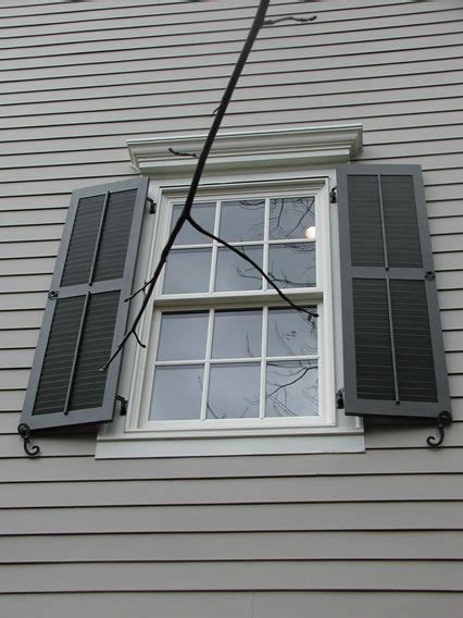 Louvered Shutters With Faux Tilt Rods And Pull Rings Scroll Tie Backs