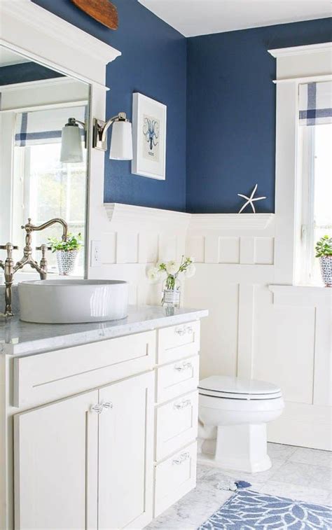Navy blue cabinetry and marble benchtops are a match made in bathroom heaven. Navy Blue and White Bathroom - Saw Nail and Paint ...