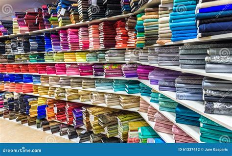 Rolls Of Fabric And Textiles In A Factory Shop Or Store Stock Photo