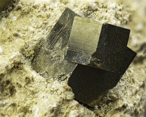 Shining Pyrite Mineral On Matrix Showcasing Metallic Luster And