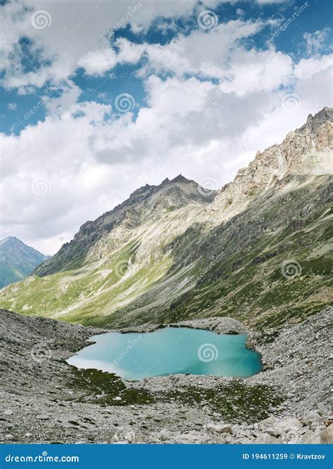 Turquoise Mountain Lake Among Rocky Hills Majestic Wild Nature