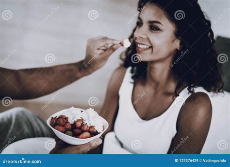 Man Is Feeding His Girlfriend With A Strawberry Stock Image Image Of