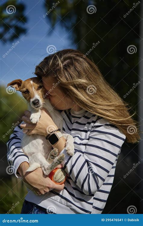 Woman Hugging And Kissing Her Dog Stock Image Image Of Happiness