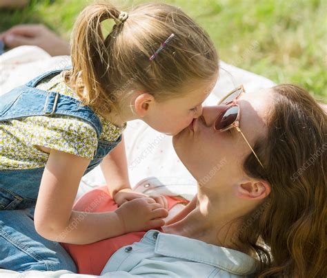 Close Up Mother And Daughter Kissing Stock Image F
