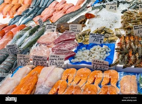 Fresh Fish And Seafood For Sale At A Market In Brixton London Stock