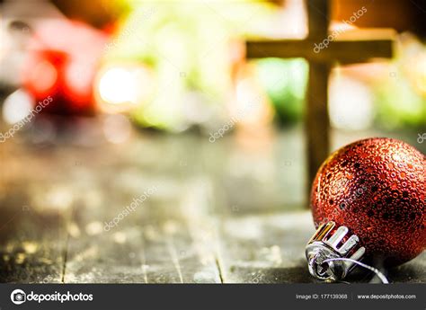 Traditional Christmas Holiday Ornaments And Christian Cross On A
