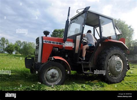 Haymaking On Countryside Poland Polish Ursus 3512 Tractor With Rotary