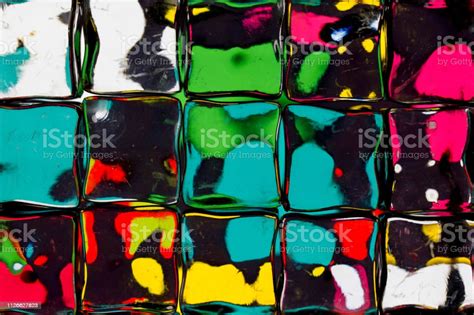 Abstract Textured Background Of A Multicolored Glass Block Wall Stock