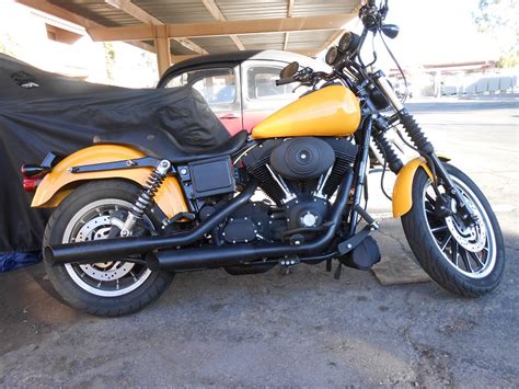Rinehart racing exhaust with extra baffles in case you want to quiet it down. 2001 Dyna FXDX - Harley Davidson Forums