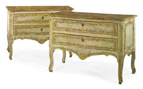 158 A Pair Of Italian Rococo Parcel Gilt Polychrome Decorated And