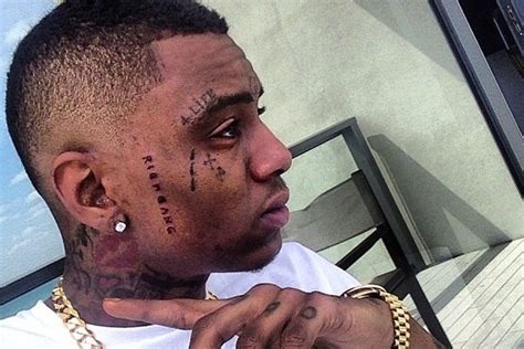Soulja Boy Signs With Cash Money And Gets Rich Gang Tatted On His Face